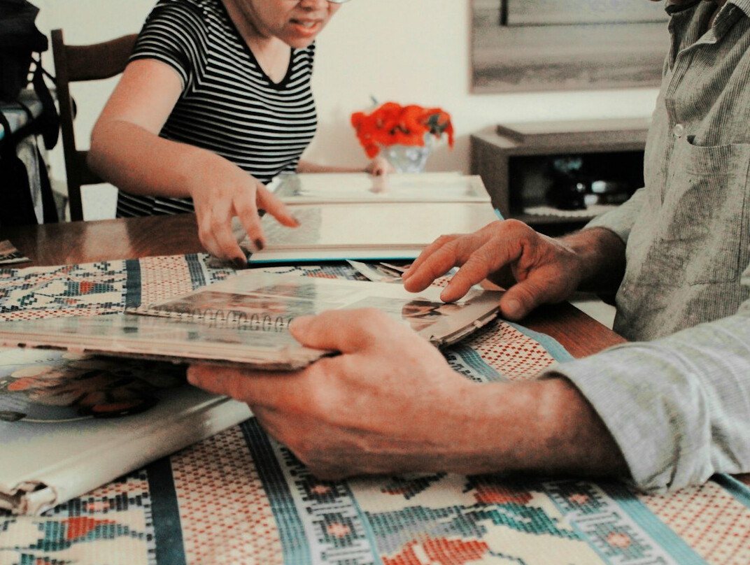 family reviewing monthly expenses
